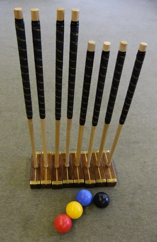 English Ash shafts with leather grip.